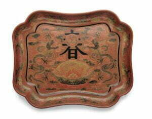 A tianqi and qianjin polychrome lacquer quatrefoil tray, Qianlong mark and period, 16.8cm long.