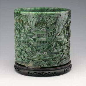 A spinach-green jade brush pot, depicting the Gathering at the Orchid Pavilion, Qing dynasty, 18th/19th century, 15cm high. Metropolitan Museum, gift of Heber Bishop, 1902