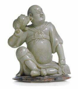 A soapstone figure of a luohan, Qing dynasty, 18th century, 13cm high, collection of Patrick Huth Jackson.